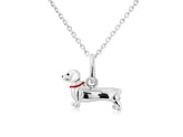 A sterling silver Dachshund dog pendant with a red enamel collar, attached to a silver chain.